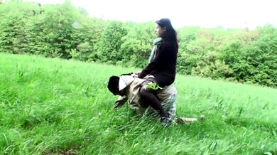 A dominant woman rides her pony boy bareback in a gritty outdoor scene
