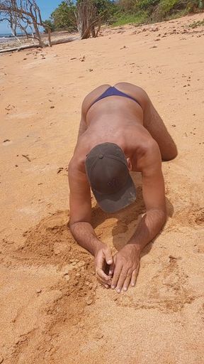 Ladysmith Doing a Striptease on the Beach Showing off Her Tanned Ass with Sexy Mark