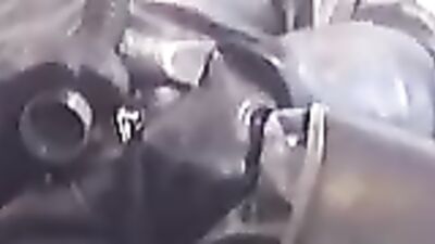 Gay dude in rubber costume is masturbating on the camera