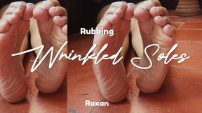 Roxan rubbing his feet he reveals very wrinkled soles (3)