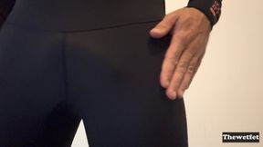 Naked, trapped in neoprene wetsuit, and stroking