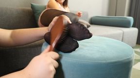 A recent Chinese female graduate wearing black sheer stockings is being tickled