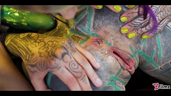 Inked girls take on huge toys, getting their holes gaped wide