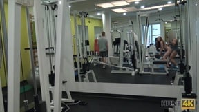 Slutty redhead is getting fucked in the gym