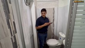 Teacher his student in the bathroom.