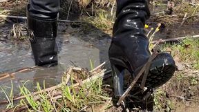 Dior knee high boots in mud, boots in swamp, high heels boots in mud, wet Dior boots, Dior high heels in mud, boots in mud, wet boots, knee high high heels boots in mud