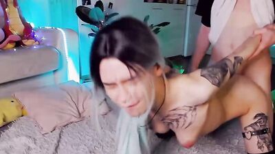 A pair of inked webcam girls are playing lesbian games before an FFM anal threesome