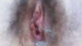Tiny teen pussy getting poked with a small hair brush