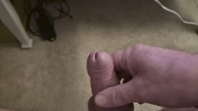 My Friend Sits in a Chair and Jerks off His Cock While Watching Video