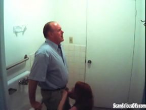 Bathroom slut sucks dick in restroom
