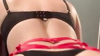 Red  ebony lace ducks vibrator while inside front of mirror