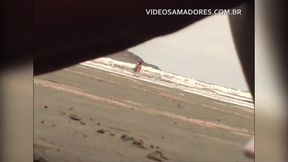 Shameless couple has sex in the shallow sea