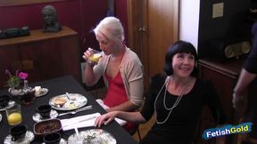 Dominant lesbian MILF takes strap on to fuck her skinny slave