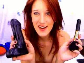 Redhead happy beauty on webcam undresses and picks a dildo