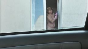 Nude woman neighbor sexy mature Milf without panties and bra washes windows her apartment  A taxi driver watches from car  Solo  Naked in public Peeping Outdoor Outside Publicly Big natural tits Pussy