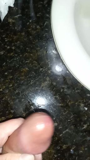 Cumshot in guest bathroom on counter