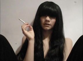 Long haired bitch smoking a cigarette