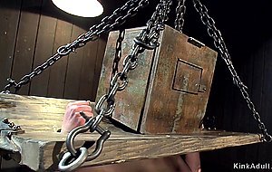 Busty slave is vibed in backbend device