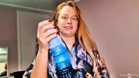 Curvy ginger stretches her tight pussy with a huge fantasy dildo