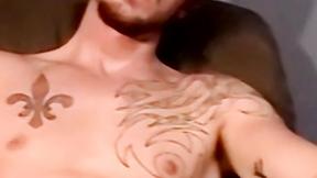 ”Tattooed marine blown by mature homo during stroking session”