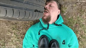 Trampling, boots licking and eating bread crushed under car tyres