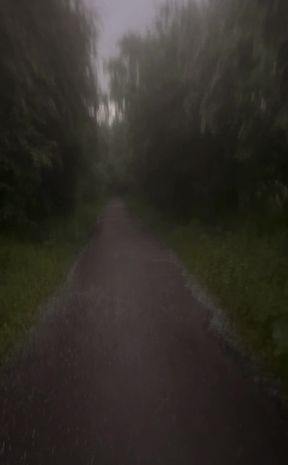 Long naked barefoot walk from car to a welcome to my town sign