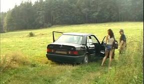 Mature Brunette Devours Cock in Wild Outdoor Group Bang