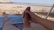 boy masturbates on the beach