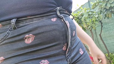 Very rare and expensive jeans pierced by a rusty nail