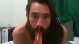 Skinny Long Haired Guy Strokes and Plays with a Dildo