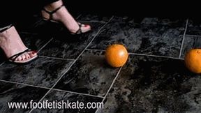 Oranges crushed with my black high heels sandals