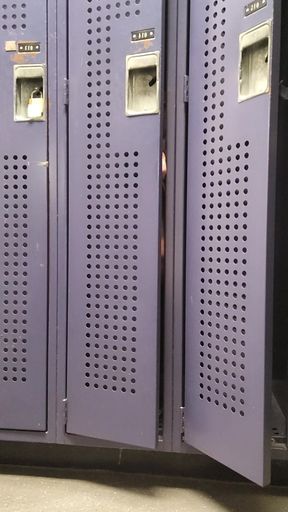 oiled, masturbating in a gym locker room
