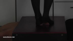 The Slave's Orgasm Under Mistress Cleo's Stocking Feet