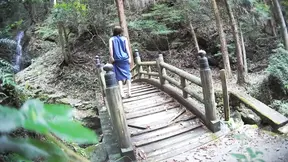 Japanese MILF stripped naked at outdoor resort photo shoot