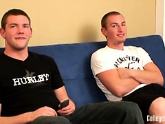 Two hot college dudes watching a porn together, stroking