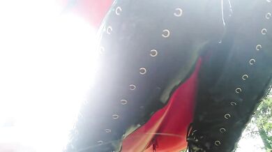 Pretty selfie while straddling red hot latex ruby curves outdoors