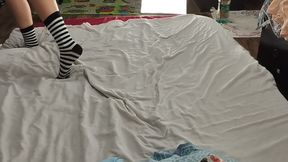 Sexy brunette doing naked chores around the house.