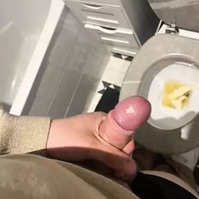 An 18-year-old masturbates in his toilet while he prepares food.