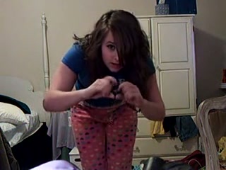 Adorable teen gal takes clothes off in front of camera