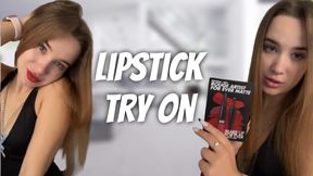 Trying on new lipstick