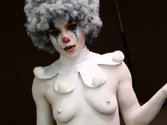 Sexy babe wears clown makeup and teases