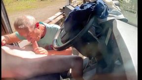 A gay truck driver gets a blowjob right in the middle of the huge parking lot