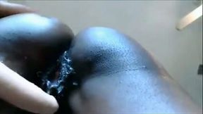 Black rather flexible cam nympho was busy with fingering her own cunt