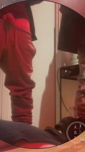 Amateur Boy Pissing in a Glass Held in His Friend's Mouth