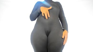 Hot milf with perfect hourglass shape in tight jumpsuit fucks herself raw