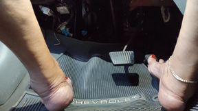 What beautiful bare feet pumping car pedals (1)