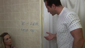 Michaela and George play in the bathroom