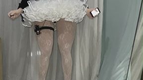 Faceless doll in hard to walk heels electrocutes and vibrates while trying not to fall
