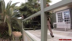 Mature Red XXX teasing outside on the patio