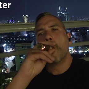 Uncut daddy smokes cigar and jerks on balcony PREVIEW